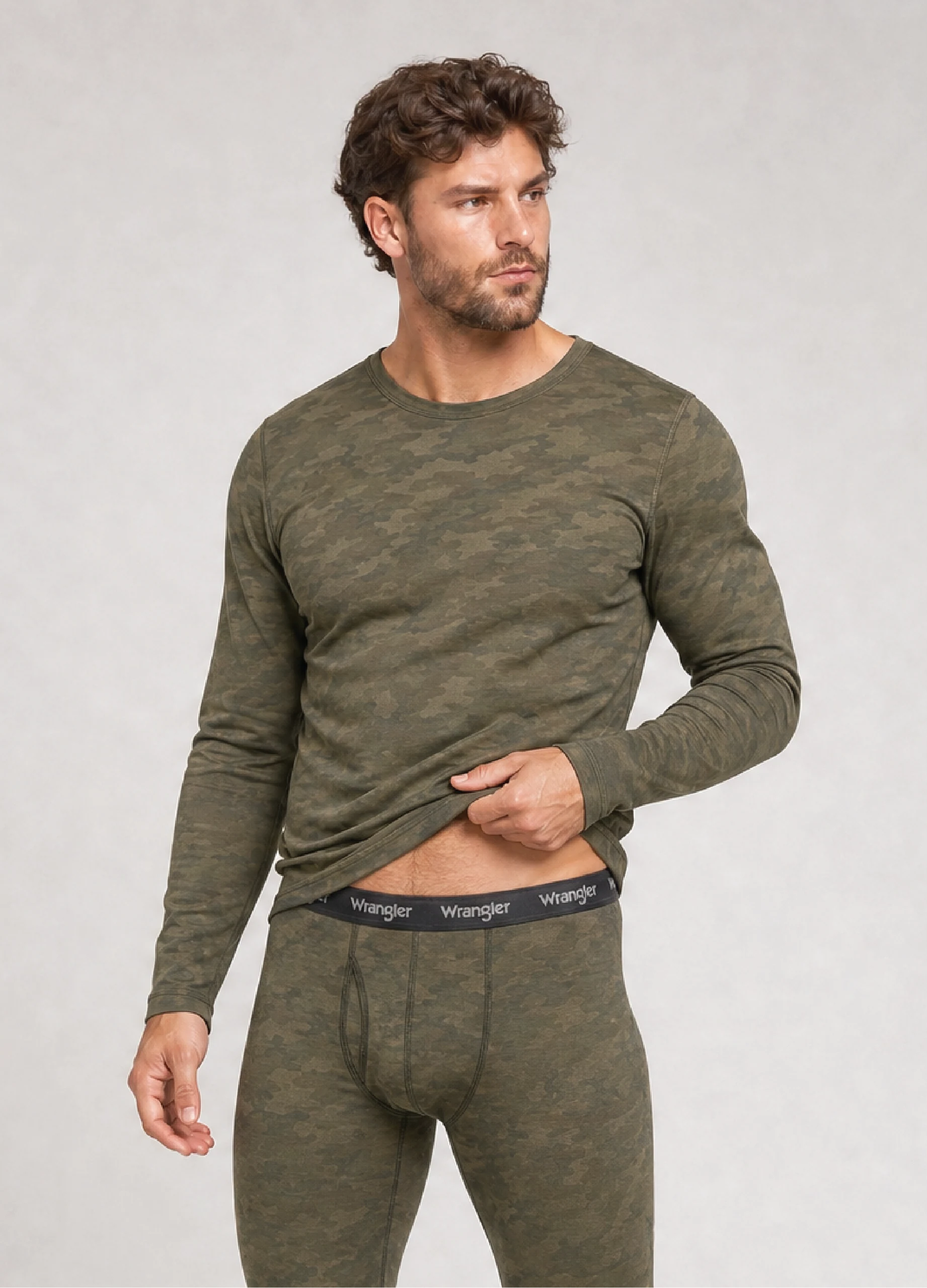 Model wearing a GMC synthetic grid base layer top and bottom