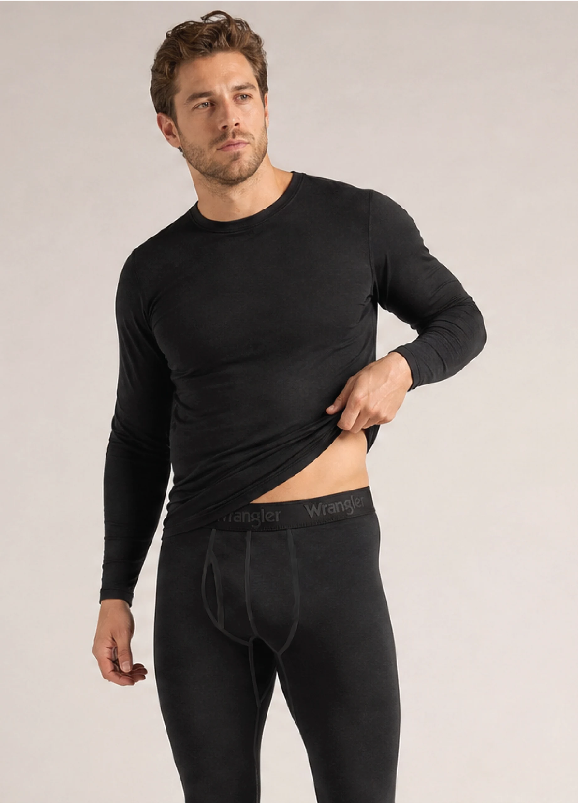 Model wearing a GMC wool blend base layer top and bottom