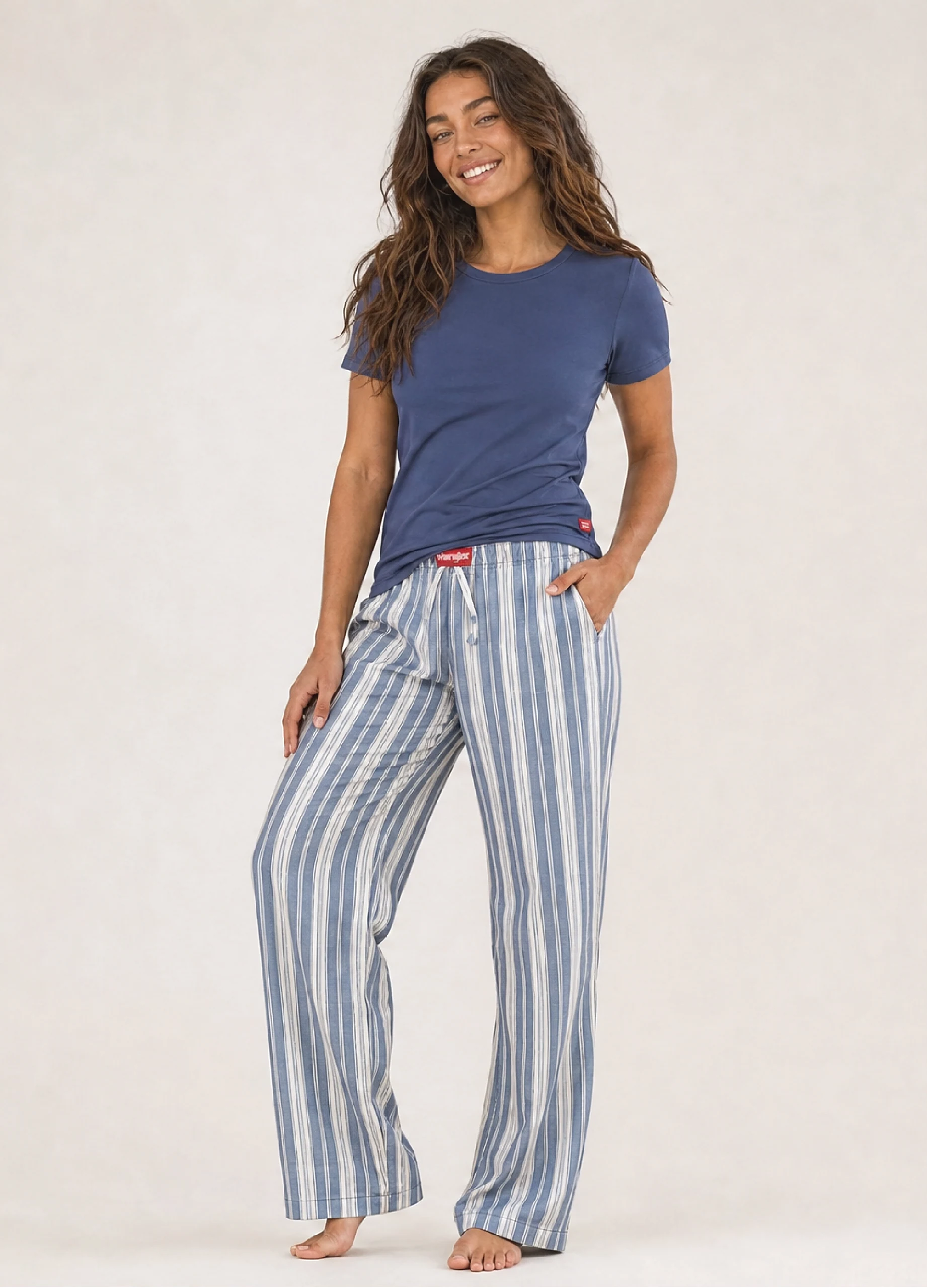 Model wearing GMC flannel sleep pants