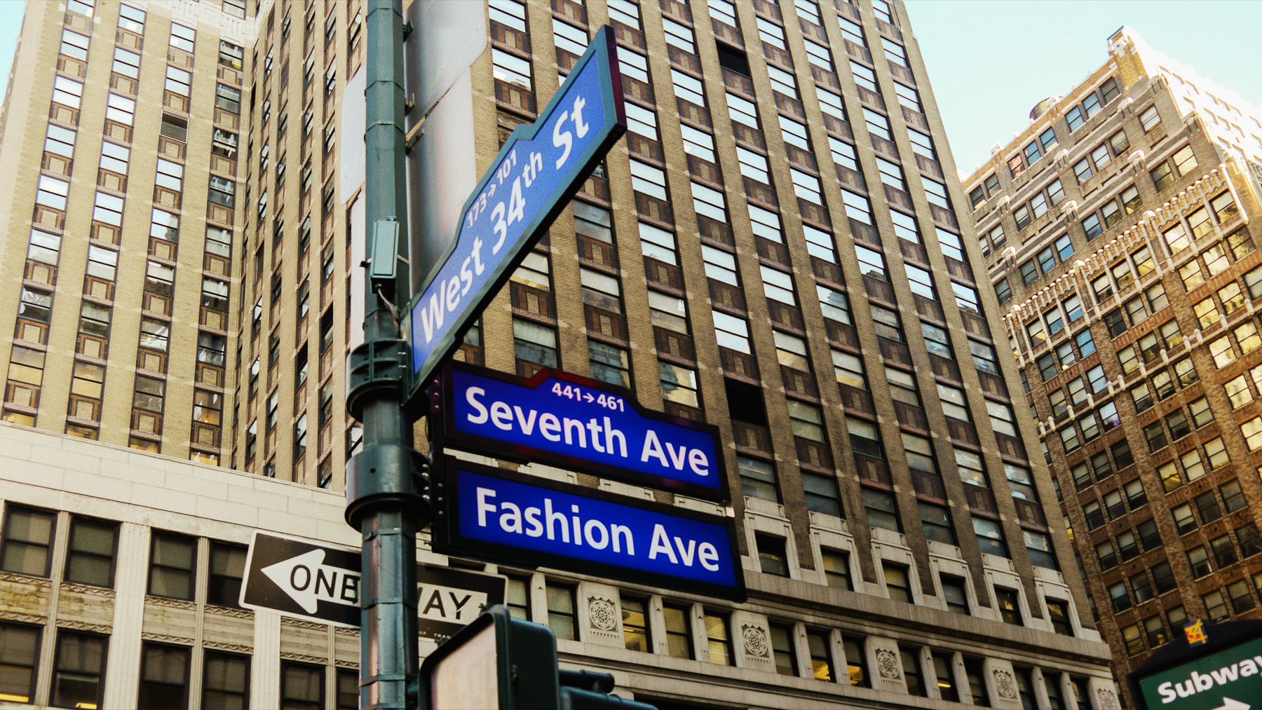 Street signs at the corner of West 34th Street and Seventh Avenue — Fashion Avenue — in New York City